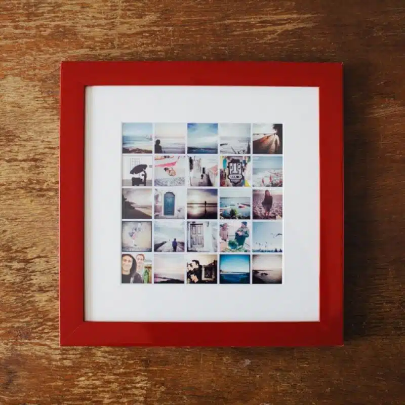Vivid photo collage in a stylish red framed shadow box on wooden surface.