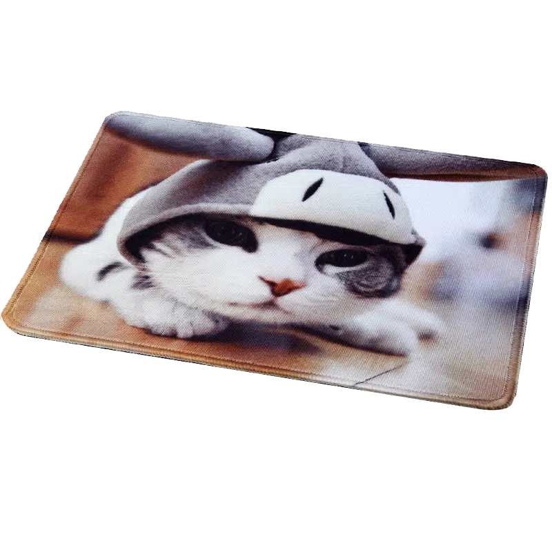 Cute cat wearing a cow costume mouse pad, perfect for cute desk accessories and pet lovers.