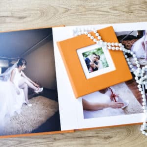 Elegant bride in wedding dress and veil, preparing on a photoshoot session.